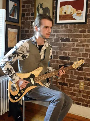 Goldfinch Guitar founder and designer Philip Smith featured in Burlington County Times