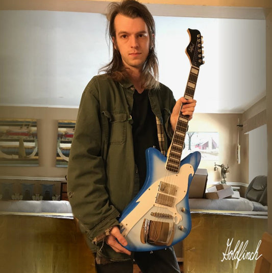 Goldfinch Guitars creator Philip Smith with the kensington guitar